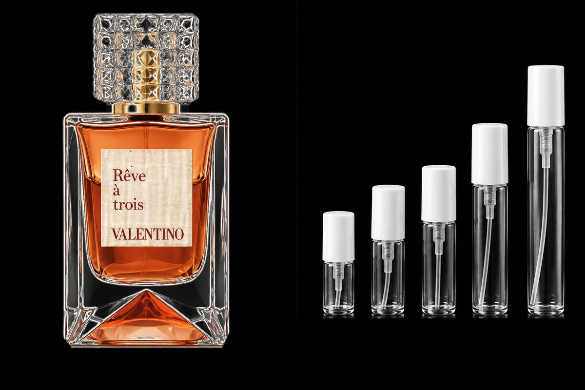 Valentino Rêve à Trois with five blank white cap sample atomisers on a black background