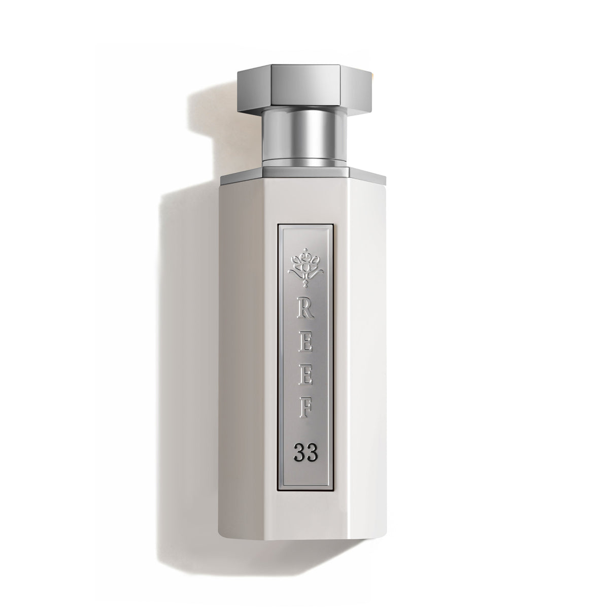 REEF 33 White perfume bottle on white background
